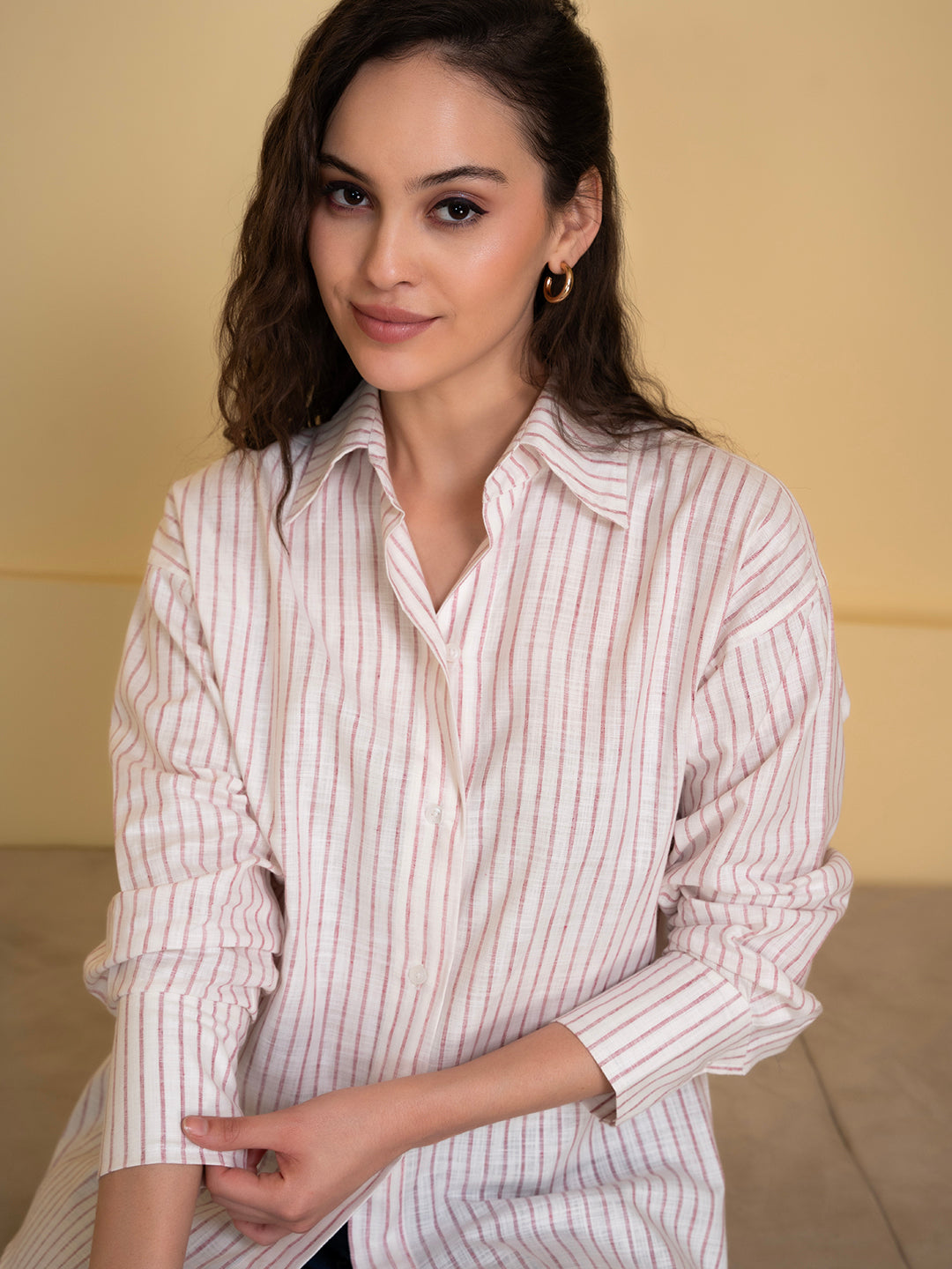 Front view of white and pink linen blend striped shirt
