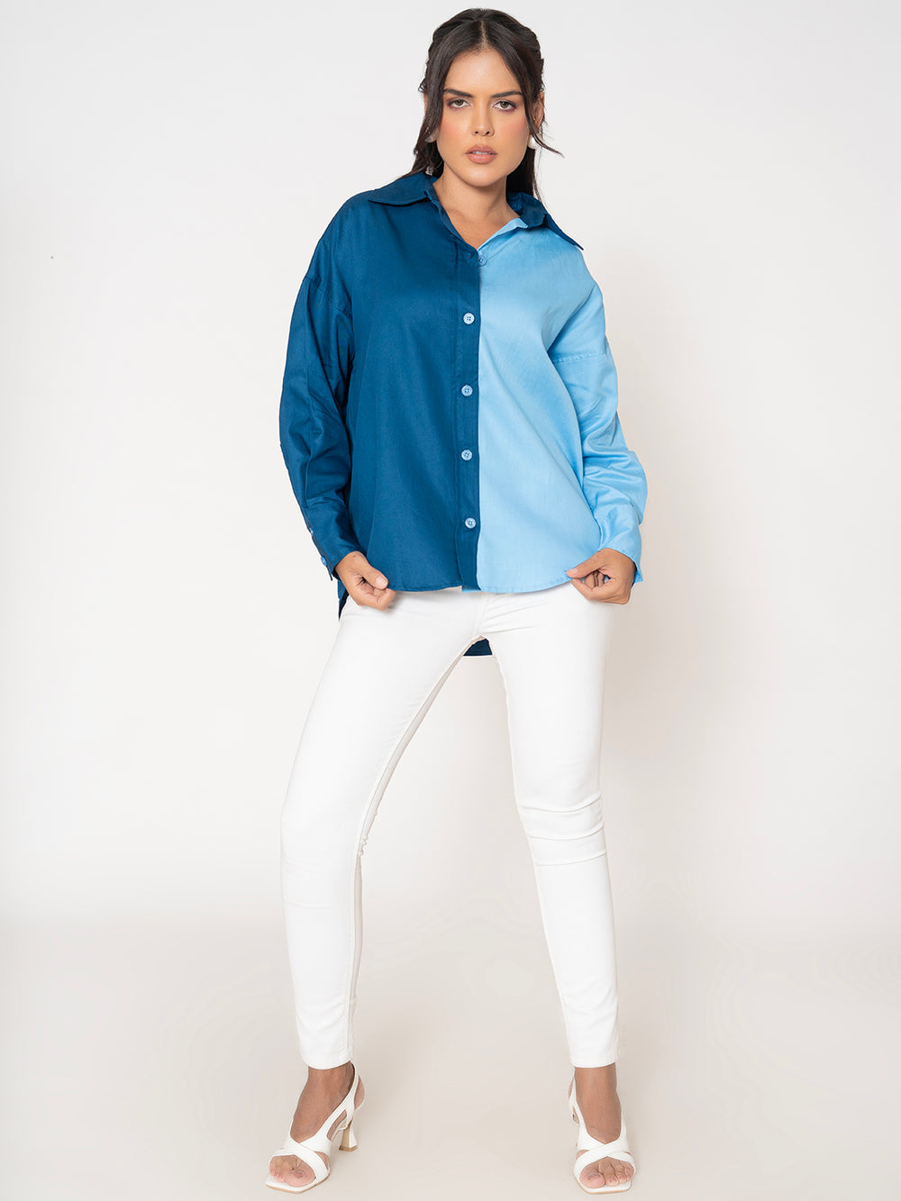Side view of navy and sky blue colorblocked oversized shirt