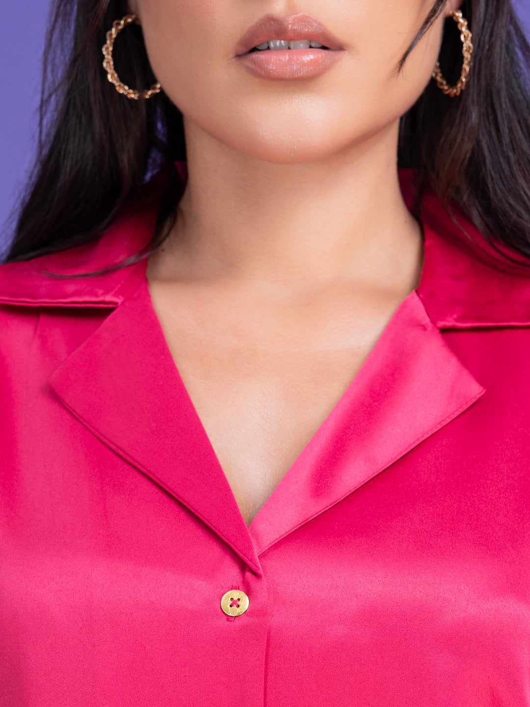 Side view of pink relaxed fit satin shirt
