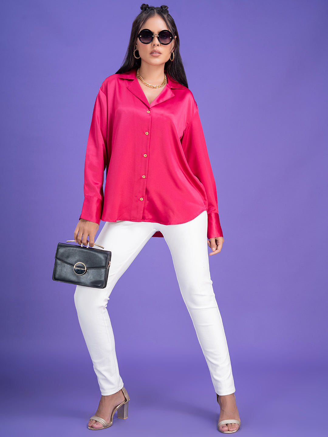 Close-up of notched collar on pink satin shirt
