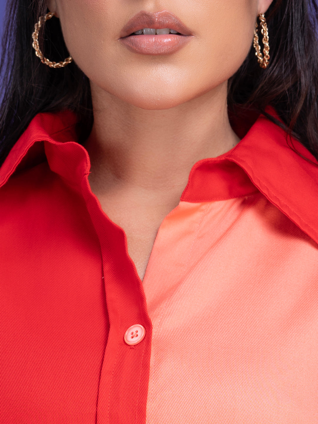 Back view of the red and peach oversized shirt