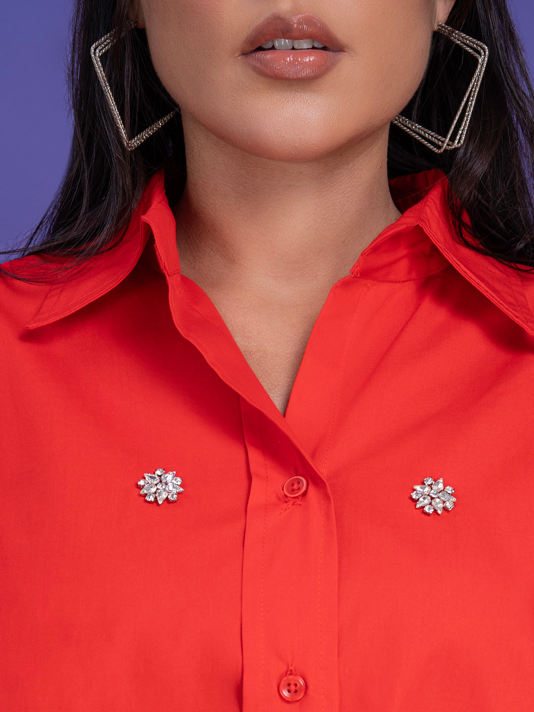 Back view of the red poplin oversized shirt