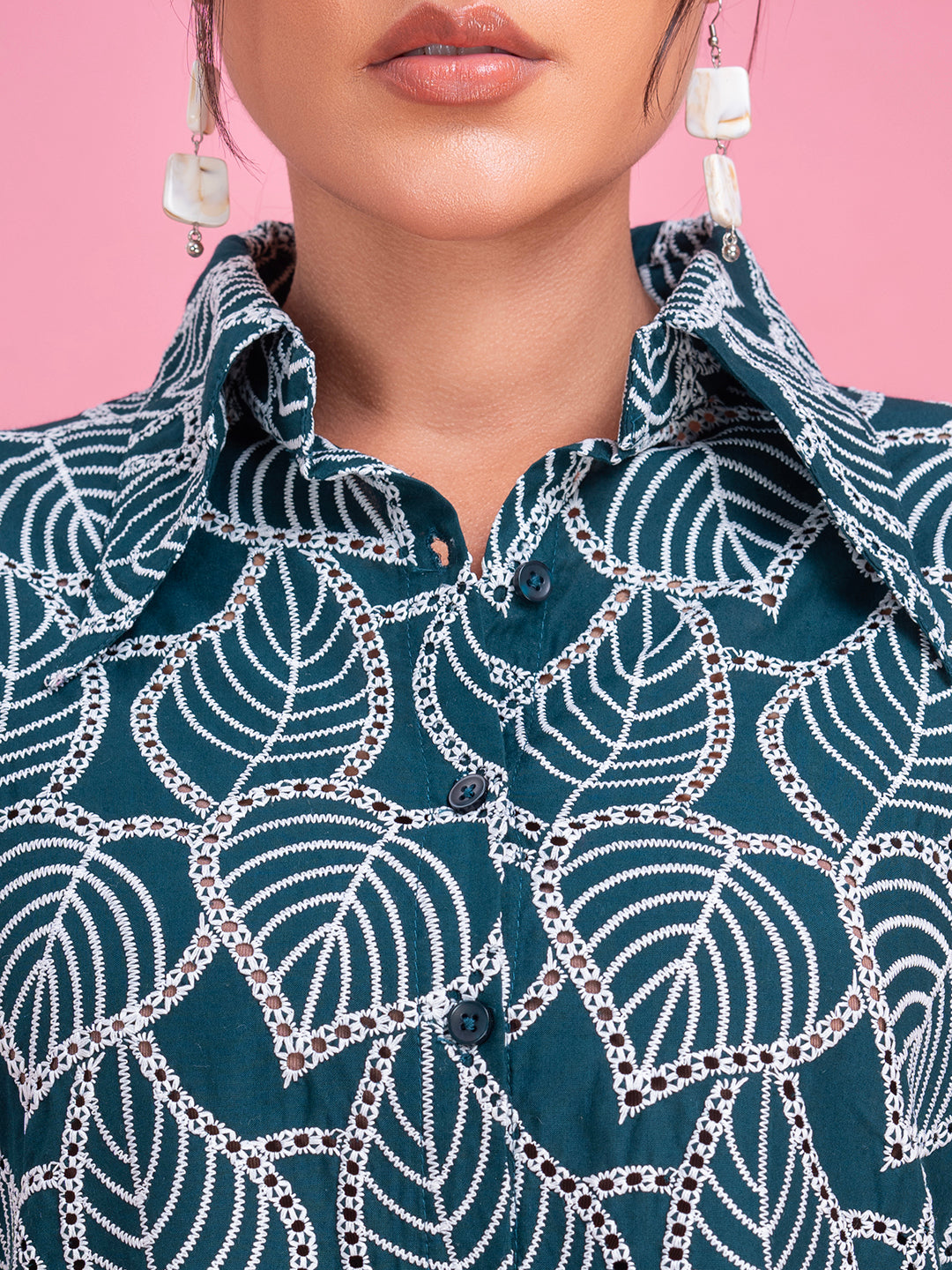 Green schiffli shirt back view with curved hem