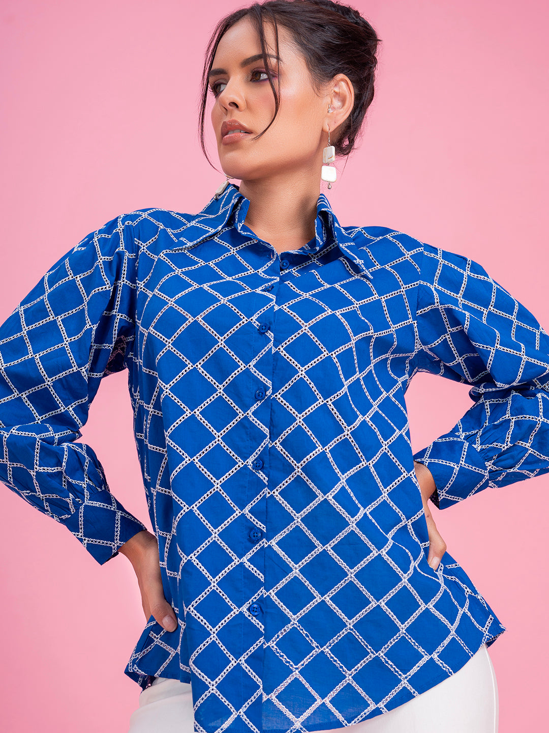 Navy schiffli shirt back view with curved hem