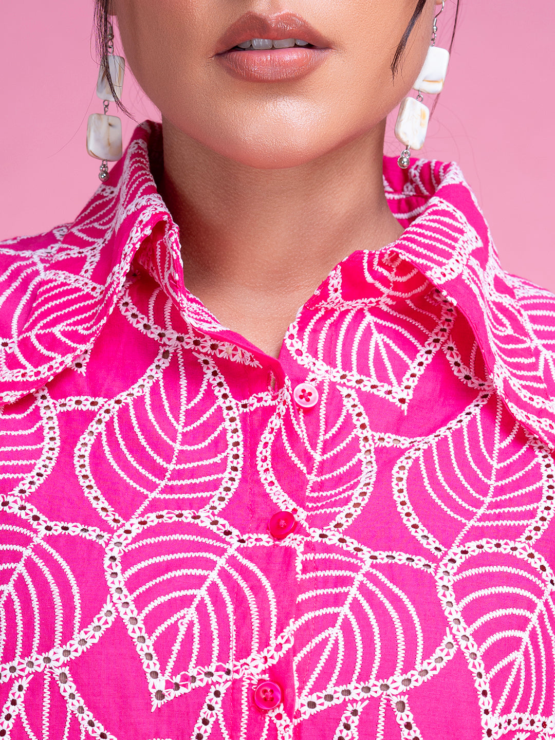Pink schiffli shirt back view with curved hem