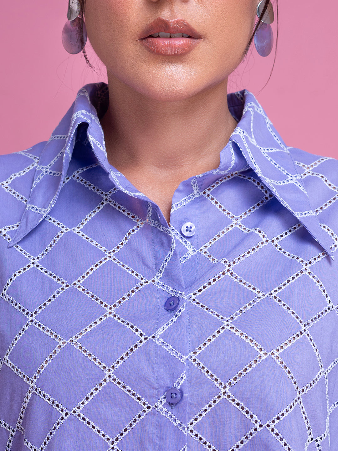 Detail of Schiffli embroidery on purple cotton co-ord