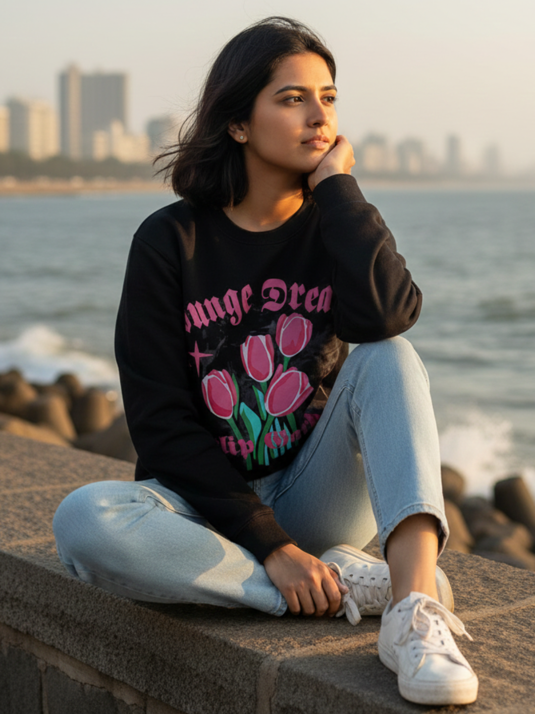 Front view of black tulip print sweatshirt for women