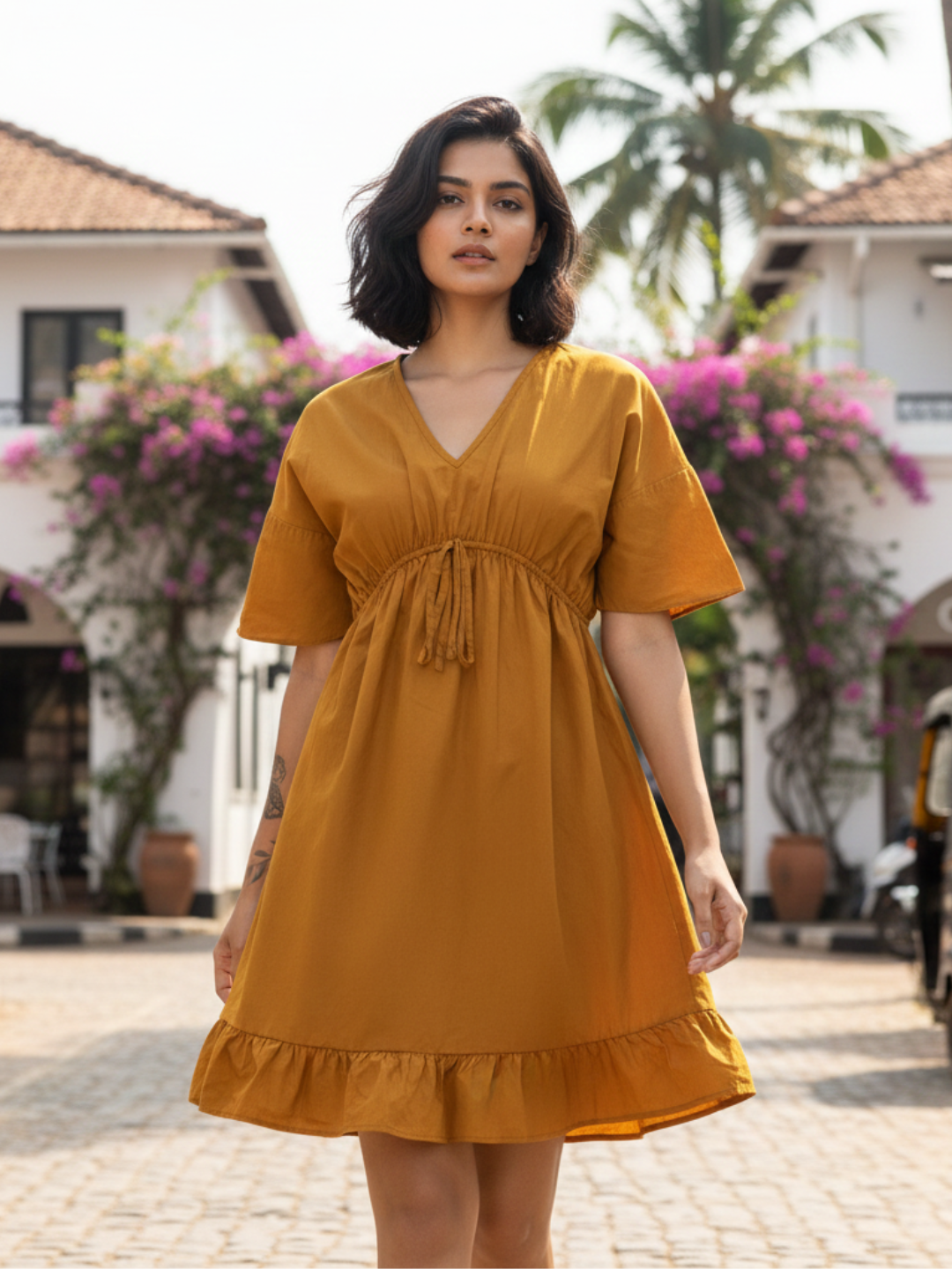 Front view of tan brown V-neck cotton dress for women
