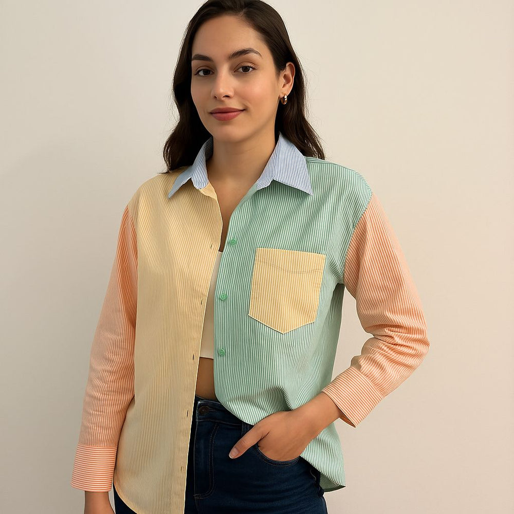 Lifestyle shot of woman wearing colorblocked striped shirt