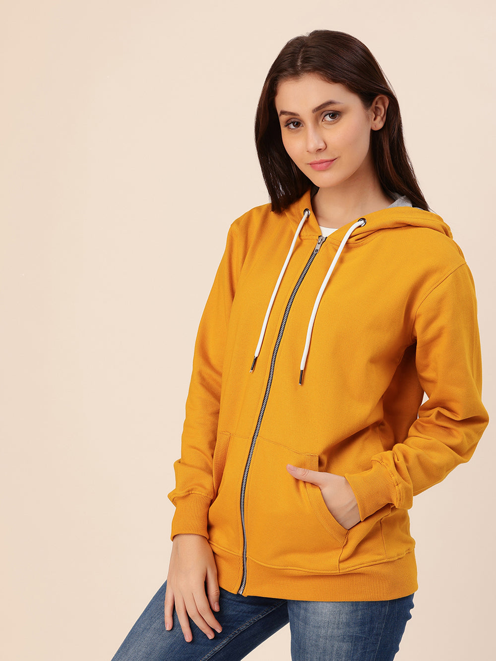 Side view of mustard hoodie with relaxed loose fit