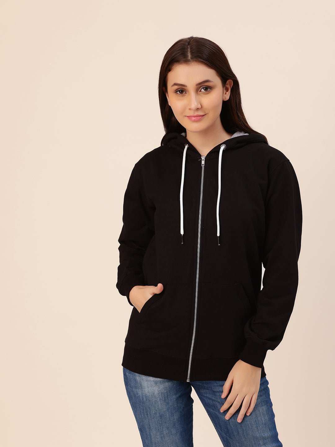 Close-up of hood and ribbed cuffs on black hoodie
