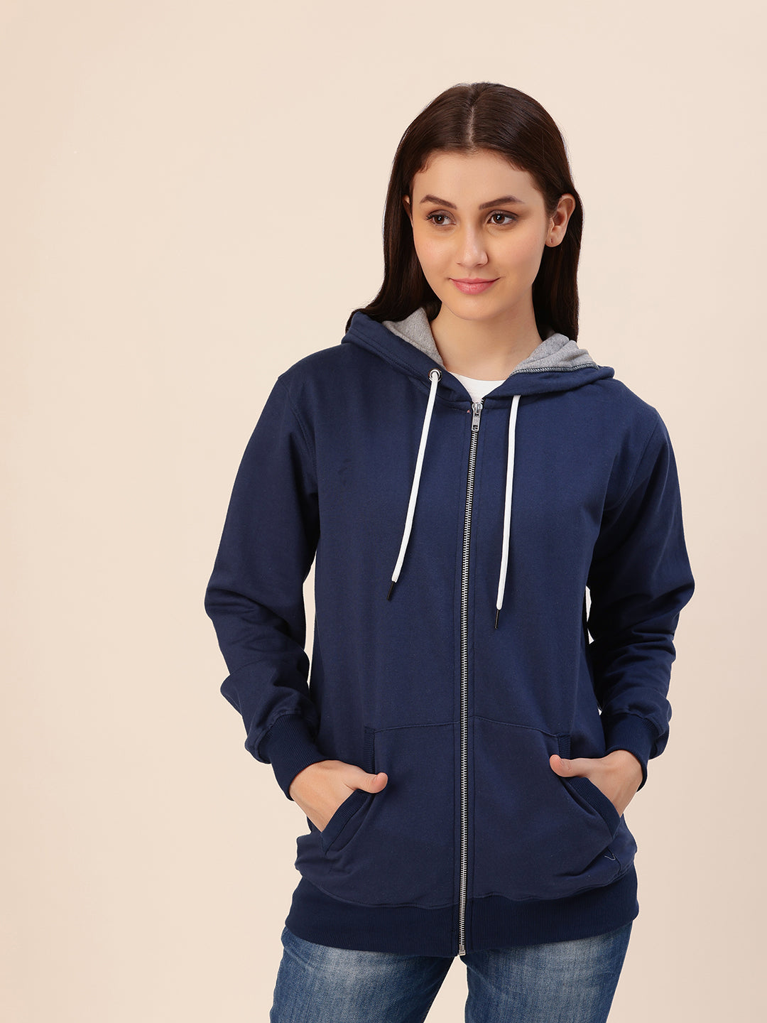 Close-up of hood and ribbed cuffs on navy hoodie
