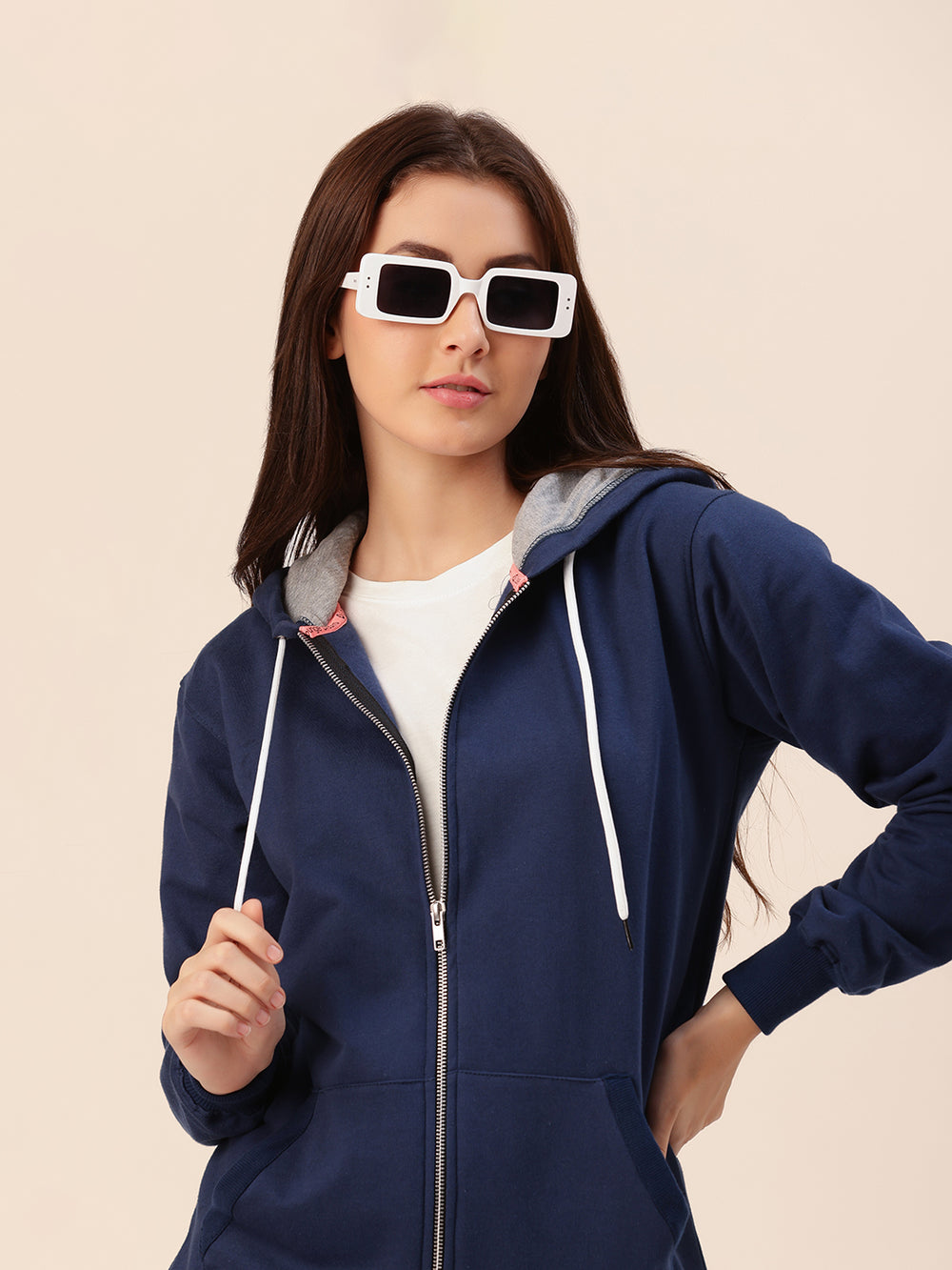 Side view of navy hoodie with relaxed loose fit
