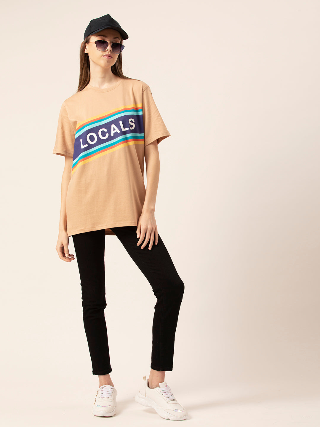 Lifestyle shot of woman in Locals oversized tee