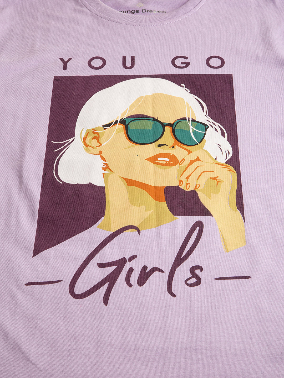 Lifestyle shot of woman in You Go Girl oversized tee