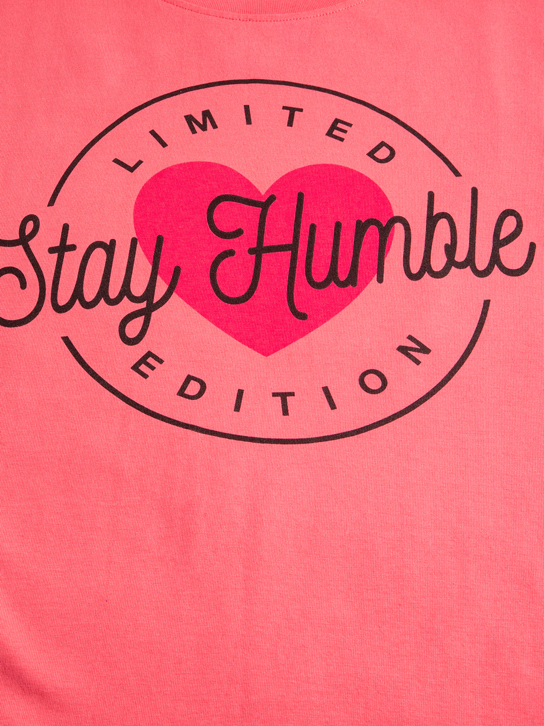 Stay Humble print close-up on bio-washed cotton tee