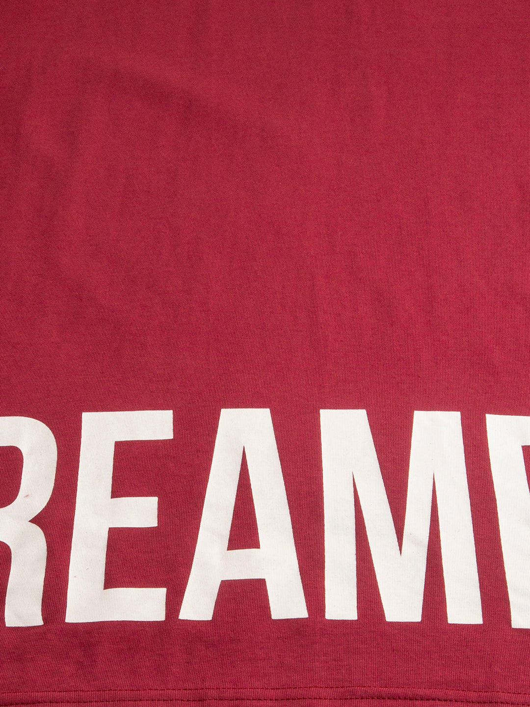 Lifestyle shot of woman in Dreamer oversized tee