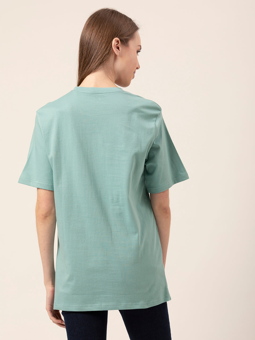 Lifestyle shot of woman in Madhappy oversized tee