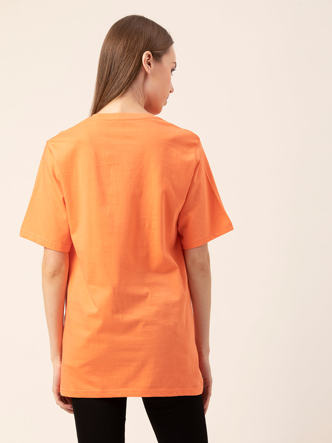 Detail shot of round neck on Smiley tee