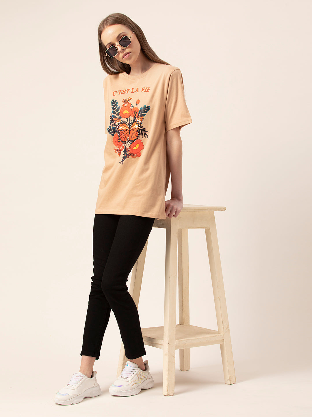 Full outfit shot styled with C'est La Vie oversized tee