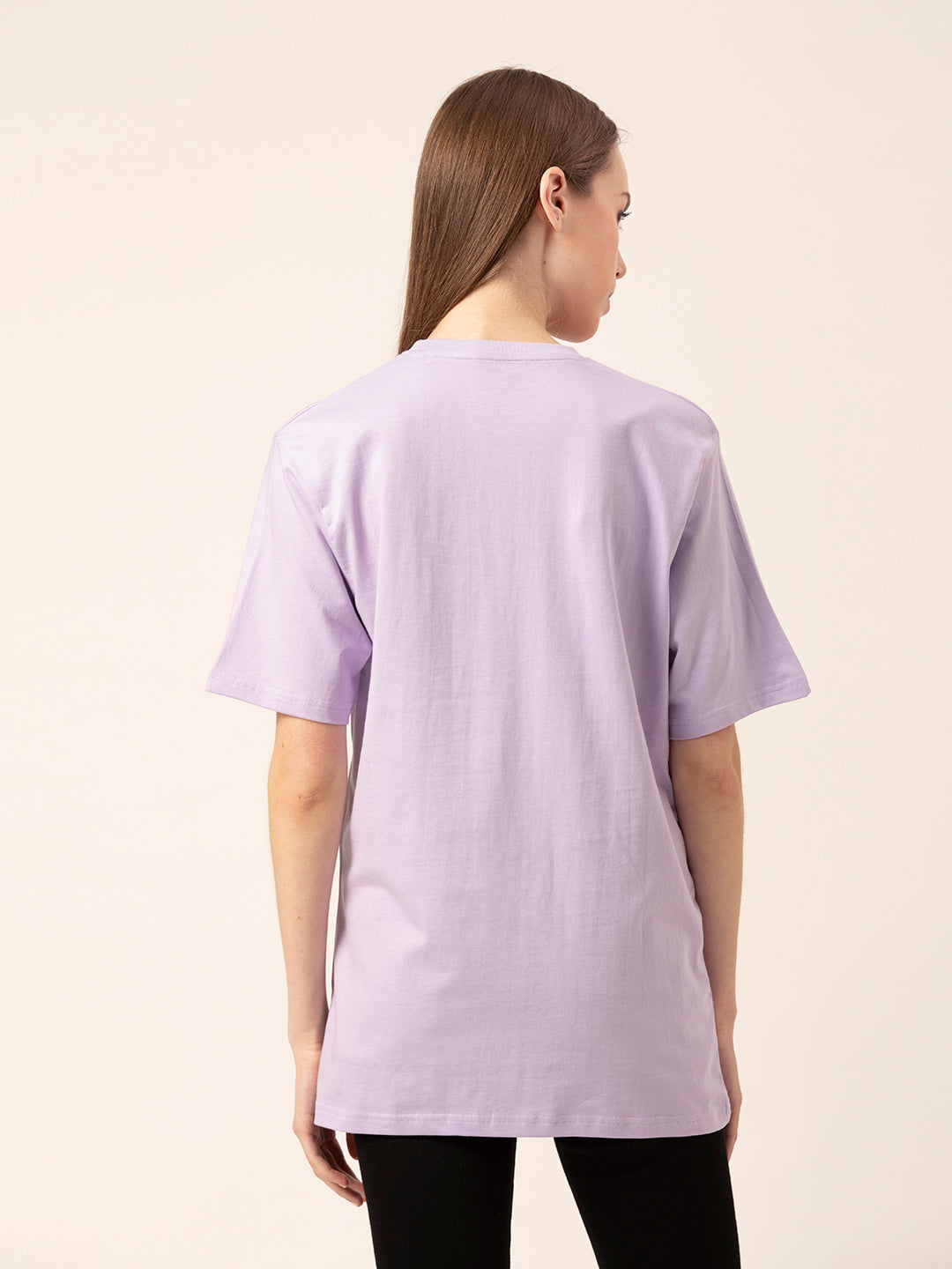 Full outfit shot styled with You Go Girl oversized tee